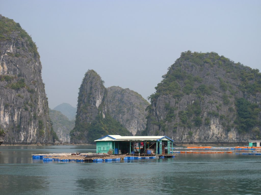Floating fish farm house in Halong bay